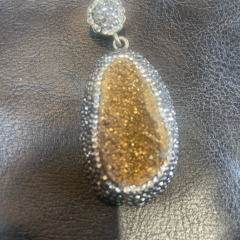 Gold Drewsey, sterling silver pendant